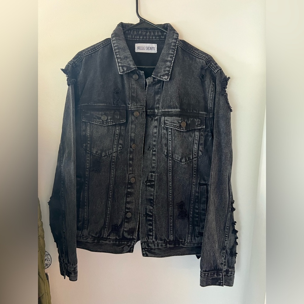 Brand new, Black distressed denim jacket  with black  embroidery 
Size: L